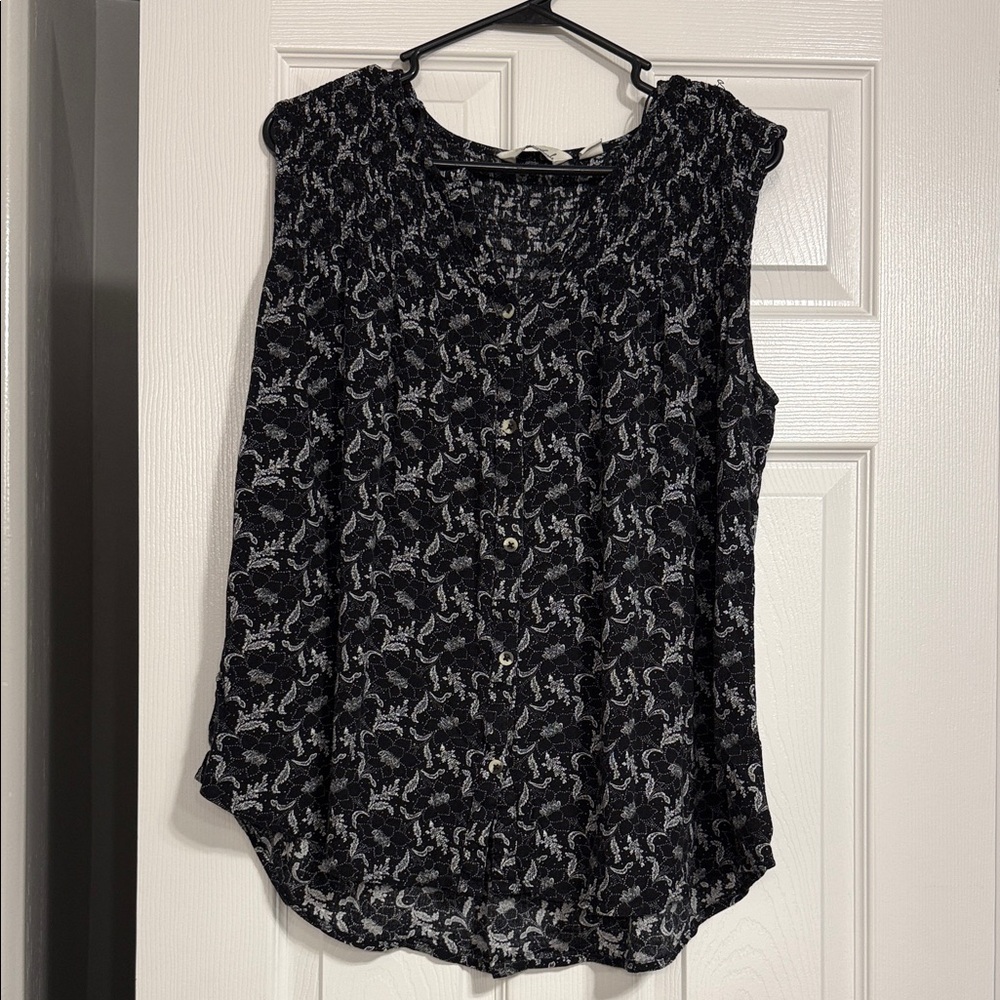 22.  Black and White Floral Women's Blouse.